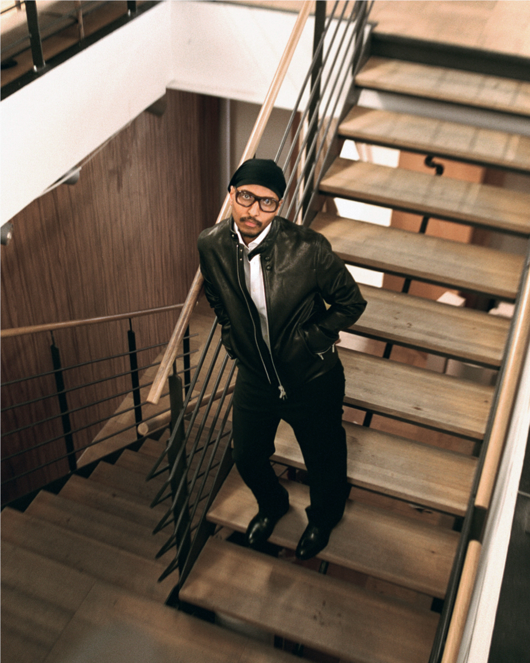 Haisam in black trousers and black leather jackete